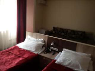 Отели типа «постель и завтрак» Мини Отель Улпан Нур-Султан Улучшенный двухместный номер с 2 отдельными кроватями-12